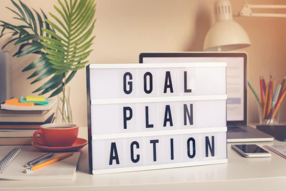 Schild mit Ziel, Plan, Action